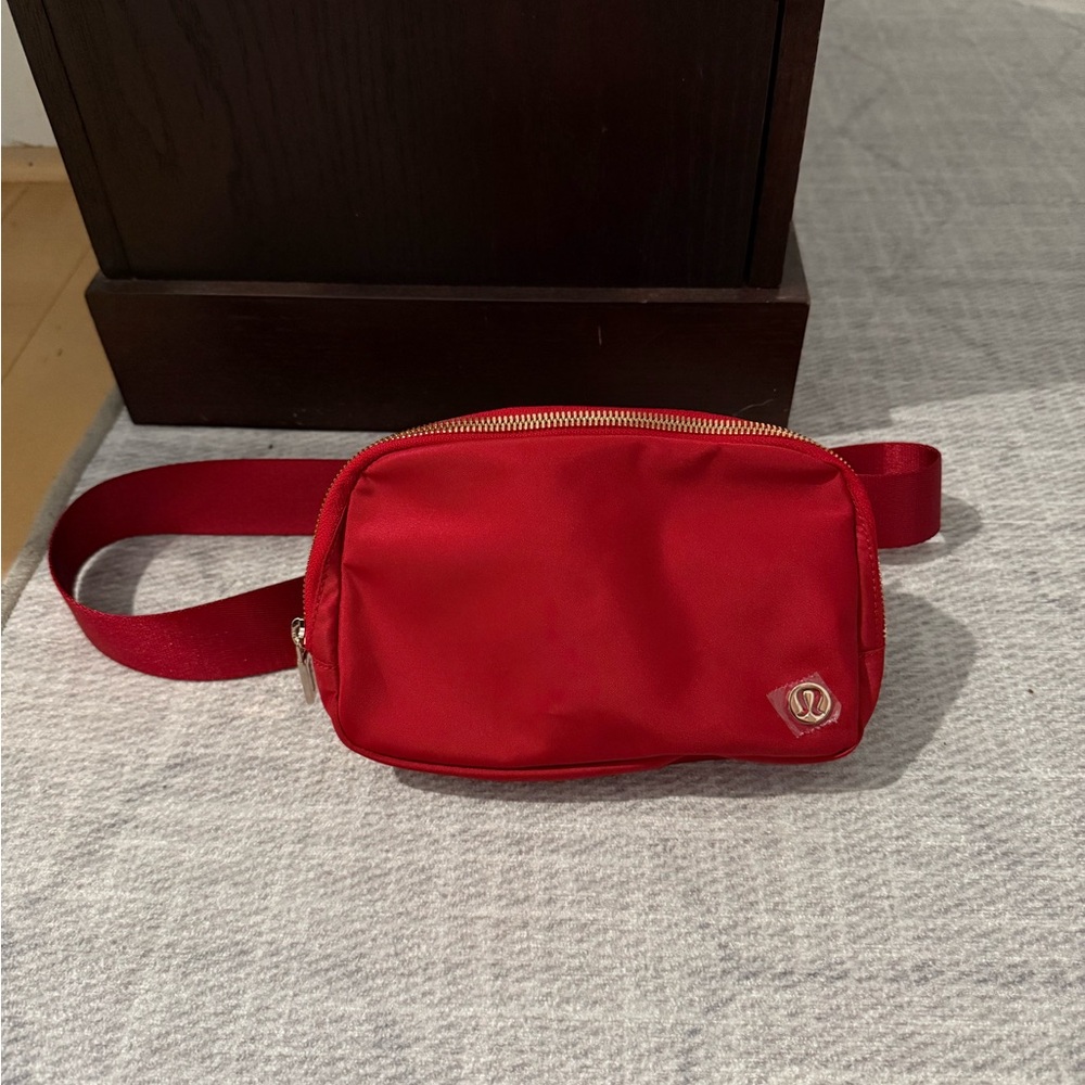 Lululemon Athletica Dark Red Belt Bag with Gold Buckle